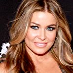 Fourth pic of Carmen Electra shows lega and cleavage