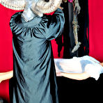 First pic of Busty Satanic Babe Brandy seducing a priest in the evil church