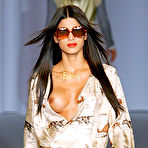 Third pic of Raica Oliveira see through and titslip runway shots