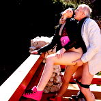 Third pic of Naughty babe fucking and sucking a dirty old man outside