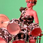 Third pic of Rihanna sexy posing in fishnet costume