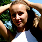 Fourth pic of Public flashing - Nude posing on lake shore crowded with sunbathers