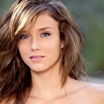 Fourth pic of Malena does a poolside striptease in her black and blue two-piece.