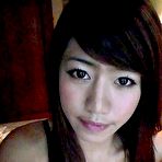 Second pic of Me and my asian Asian coed goes full nude in couch shows squeezable tits