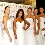 First pic of Monica Cruz shows deep cleavage in long white dress