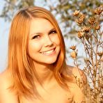 Second pic of Erotic redhead teen naked outdoors as the sun sets