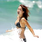 First pic of Myleene Klass cleavage in black bikini on the beach