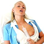Fourth pic of Pretty nurse bitch Mariana toys herself at gyn practice