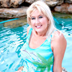 First pic of NaughtyMag.com - Marina Johnson - Curvaceous cougar wets her pussy.