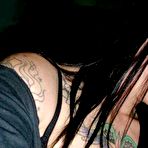 Fourth pic of Photo selection of an amateur tattooed babe dildoing her twat