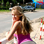 Second pic of Public flashing - Sexy teen caught flashing her shaven pussy