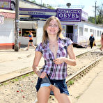 First pic of Public flashing - Busty exhibitionist babe walks in the rain topless