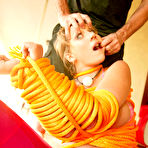 Third pic of Nikki Sexxx gets roped and dipped by a huge jizzknob @ Milf Humiliation