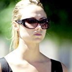 Fourth pic of Stacy Keibler in blue and pink bikini on the beach paparazzi shots