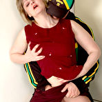First pic of Matures and Pantyhose - Lusty mature chick in shiny hose petting herself looking at nude hung chap