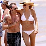 First pic of Malin Akerman caught in white bikini on the beach in Hawaii