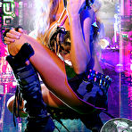 Second pic of Tough Busty Blonde Posing With A Gun