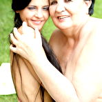 Fourth pic of Horny mature slut getting nasty with a hot babe by the pool