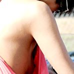 Fourth pic of Bai Ling in short pink dress titslip paparazzi shots
