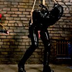 First pic of SexPreviews - Claire Adams femdom in latex strapons and spanks bound rubberboy