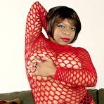 First pic of Titties ebony mum squeezes and exposes her giant boobs