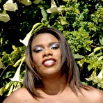 Second pic of Fattish ebony big titted princess poses and toying outdoors