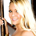 Fourth pic of porn star Jessie Andrews peels off her sexy black lingerie in the bedroom!