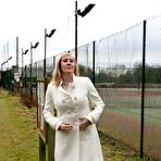 First pic of SexPreviews - Natasha Smith blonde MILF showing her pussy in tan pantyhose near tenniscourt