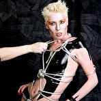 Fourth pic of FetishDolls.com | Bondage & Lesbian Fetish Videos, Kinky Fetish Girls, 
Kinkiest Lesbian Fantasies, featuring boot and heel worship, sexy smoking, spankings 
and nipple torment, and tons of sloppy wet strap-on sex and anal play