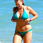 Third pic of Natasha Henstridge wearing a bikini at a beach in Hawaii