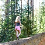 Fourth pic of Busty blonde takes a piss outdoors