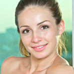 Fourth pic of Susana C slim physique and cute face stands out against the aquamarine backdrop