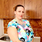 First pic of Horney chubby housewife plays her mega boobs with long dildo