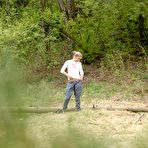 First pic of Nice ass blonde babe with shaved pussy takes a piss outdoors