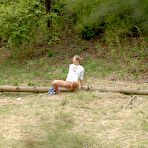 Third pic of Nice ass blonde babe with shaved pussy takes a piss outdoors