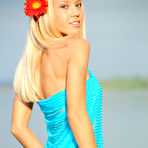 Second pic of Marina C - Marina C takes her sexy blue dress off and shows us her round perky boobs outdoors.