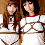 Second pic of Dimdim Asian and nasty babe have boobs and hands tied in ropes
