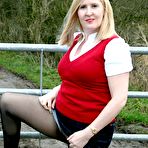 Third pic of SexPreviews - Natasha Smith blonde MILF outdoors in black pantyhose showing her pussy