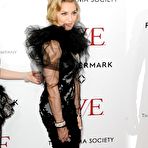 Second pic of Madonna posing for paparazzi at premiere