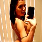 Second pic of Teen takes pix of her new fake titties