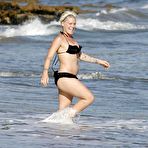 Fourth pic of Pink caught ib black bikini on the beach