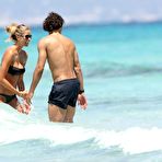 Third pic of Elena Santarelli boobslip and ass crack on the beach