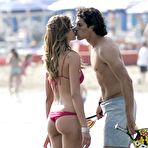 Third pic of Elena Santarelli caught in bikini on the beach