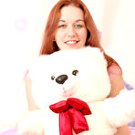 Second pic of Smokie Flame - Smokie Flame takes all of her clothes on the bed and shows us her gaping muff.