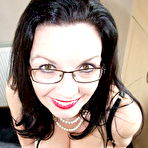Third pic of Horney housewife pose and shows her huge areolas in kitchen
