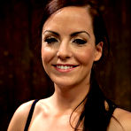 First pic of SexPreviews - Bryn Blayne bound onto a metal frame with leather straps is made to cum