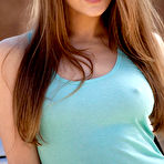 First pic of Dani Daniels showing off her awesome curves by her car