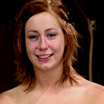 First pic of SexPreviews - Charlie Ann redhead bent over bound in wooden stocks her ass spanked red