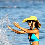 Second pic of Bai Ling cameltoe in blue swimsuit on the beach