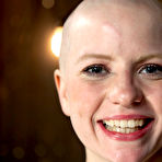 Fourth pic of SexPreviews - Alani Pi in metal device bondage gets her head completely shaved in live show